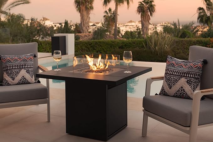 mesa con chimenea exterior bioetanol